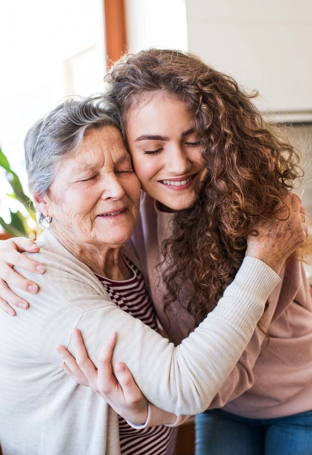 caregiver hugging senior 12