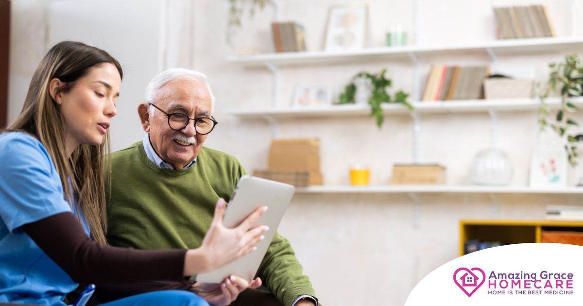Home caregiver assisting senior man to use telehealth and senior care